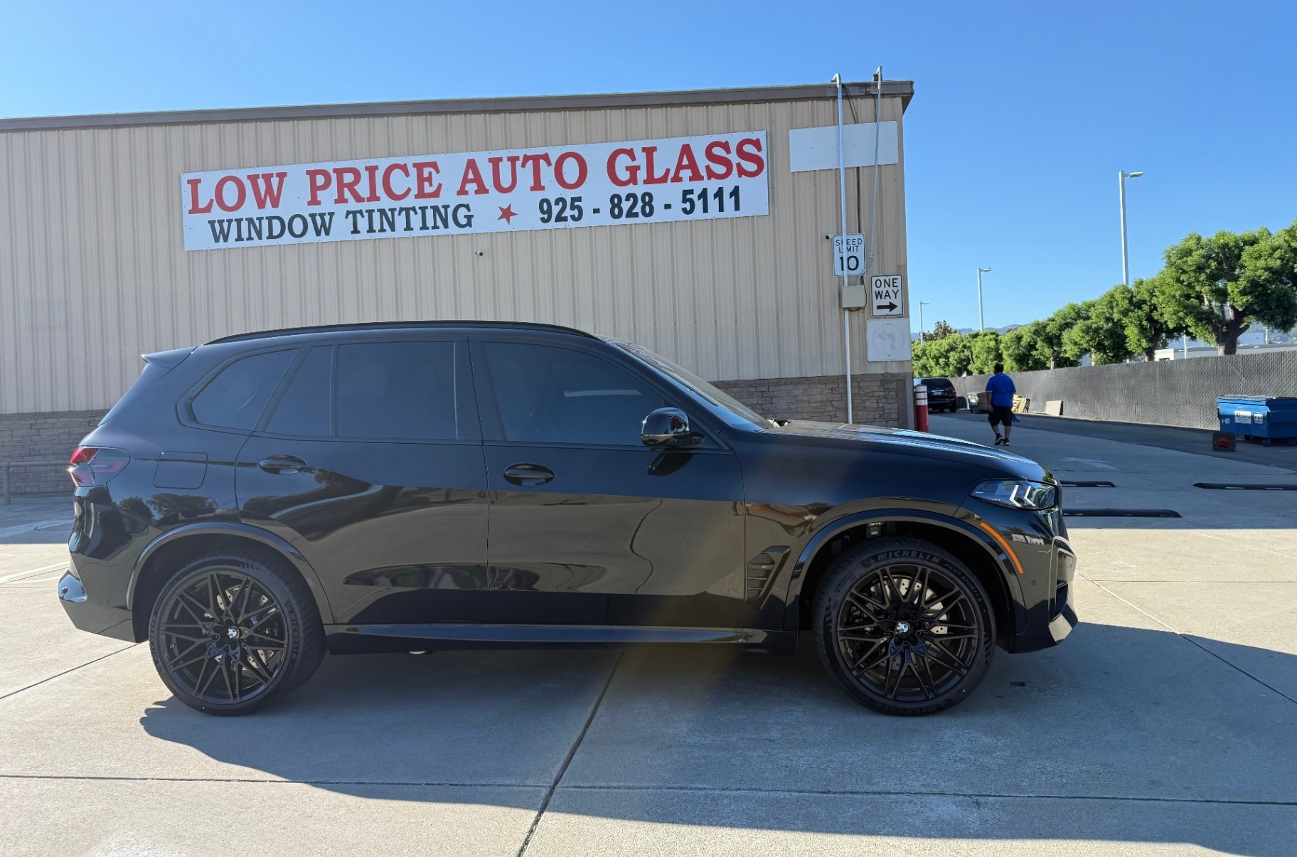 BMW X5 M side profile after ceramic tint install