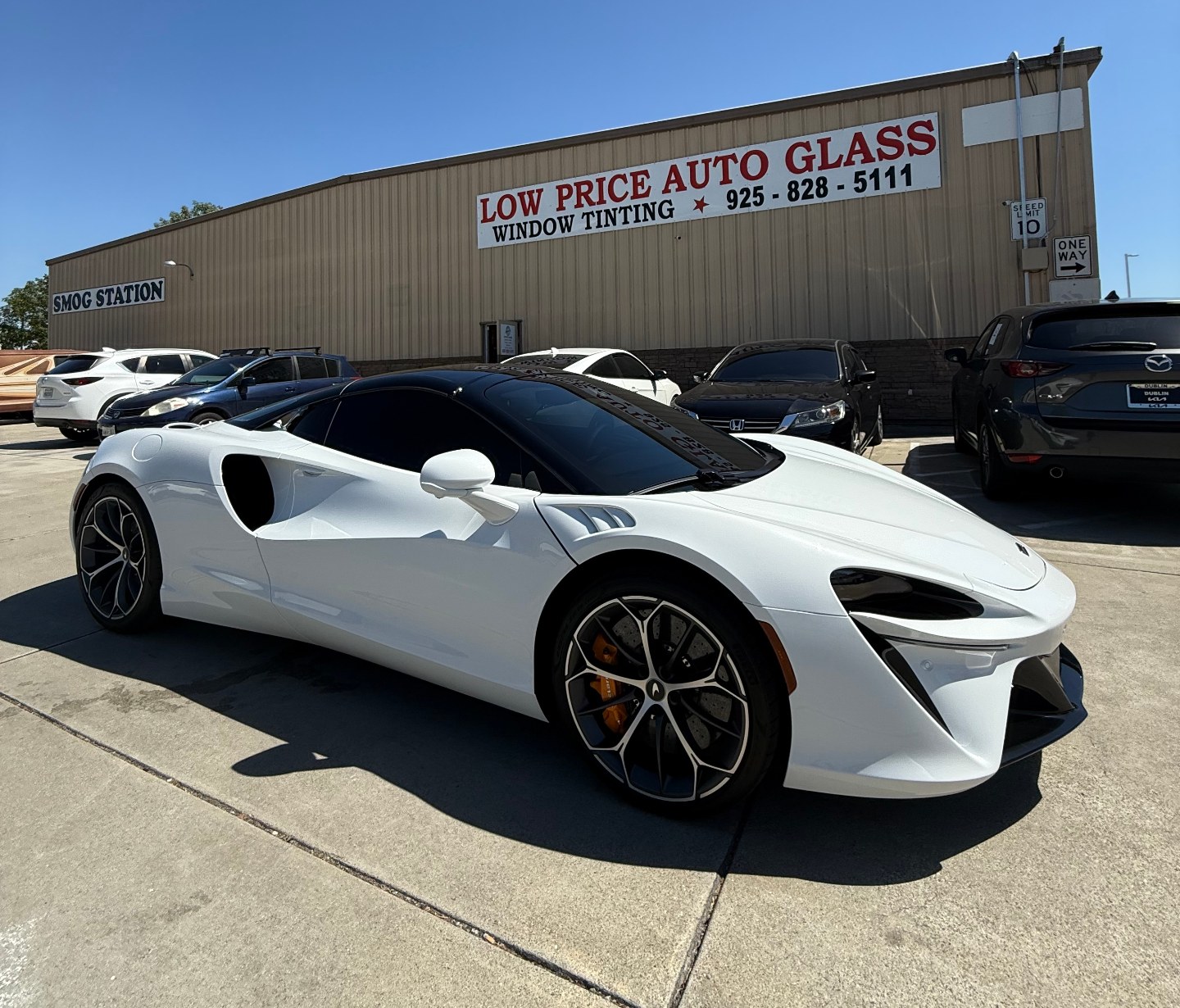 McLaren Artura with premium ceramic window tint at Low Price Auto Glass, Dublin, CA